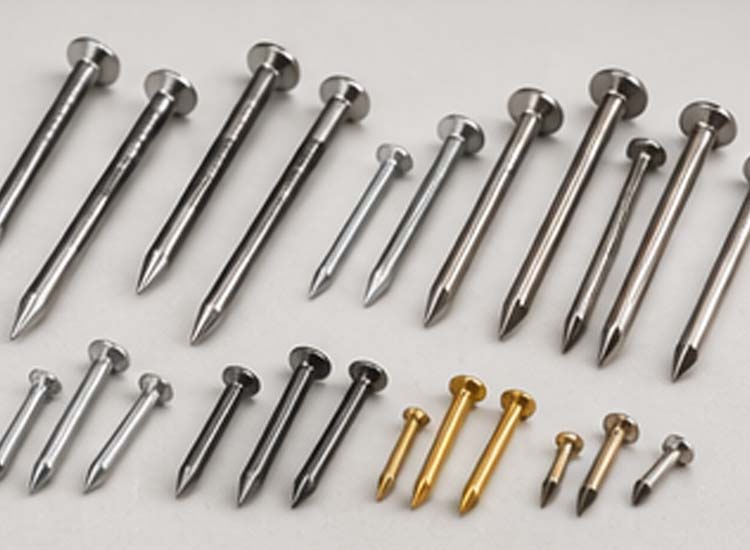 alt="various finished nails produced by automatic nail making machine with different sizes and applications"
